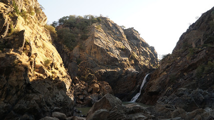 Dry desert landscapes near Epupa Falls waterfall in the Kaokoland of Namibia, Africa.