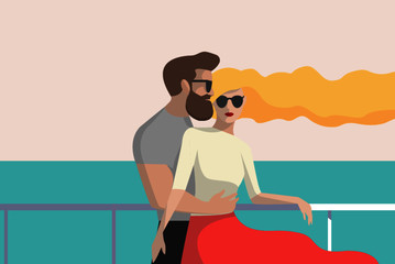 A couple stands on a deck