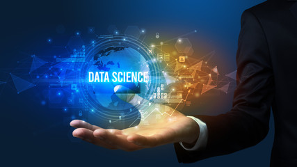 Elegant hand holding DATA SCIENCE inscription, digital technology concept