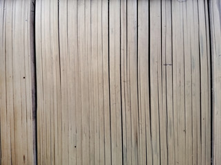 Naklejka premium old brown tone bamboo plank fence texture for background. vintage dry Bamboo wall background.