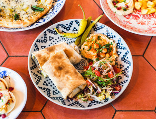 close up of Middle Eastern food on table in restaurant