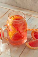 fresh lemonade with pink grapefruit, vertical image