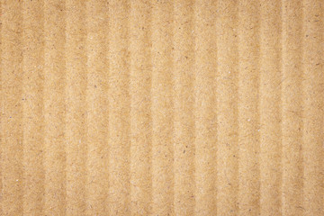 Paper cardboard background. Macro top view of natural corrugated carton sheet. Kraft cardboard...