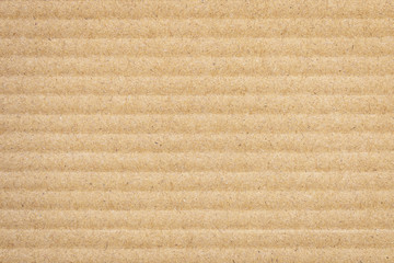 Paper cardboard background. Natural corrugated carton sheet. Kraft cardboard texture with...