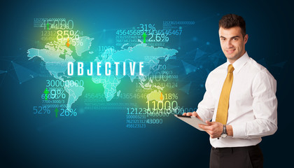 Businessman in front of a decision with OBJECTIVE inscription, business concept