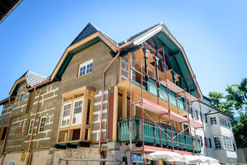 a pitched roof house under construction