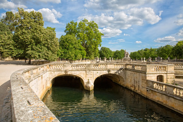 Fototapeta premium The Jardins de la Fontaine in Nîmes, pond and classical garden