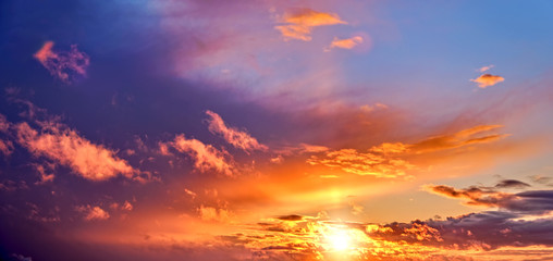sunset sky landscape background natural color of evening cloudscape panorama with setting sun rays...