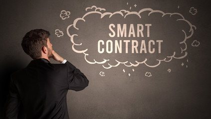 businessman drawing a cloud with SMART CONTRACT inscription inside, modern business concept