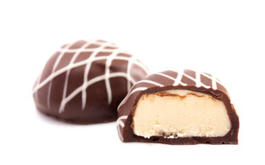 An Egg Shaped Chocolate Truffle Isolated on a White Background