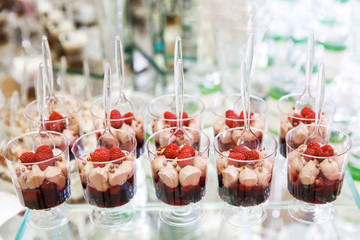 Festive table for newlyweds and guests. Dessert table for a wedding party