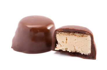 Chocolate Vanilla Cream Truffle Cut Open and Isolated on a White Background