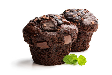 Dark chocolate muffins isolated on white