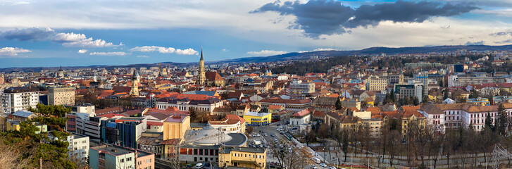Fototapeta na wymiar Aerial panoramic view of Cluj Napoca city over the famous cultural landmarks in town in a daytime , Romania