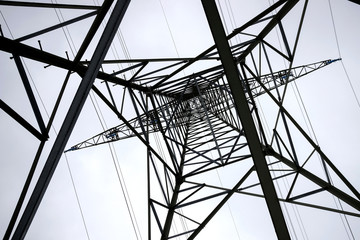 an electricity pylon from below horizontal