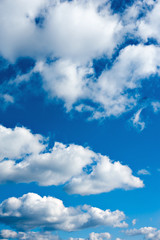 Obraz premium beautiful white clouds in bright blue sky on the nice day