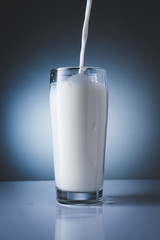 pouring milk into glass