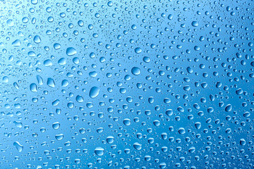 drops of water on a glass of bruise color