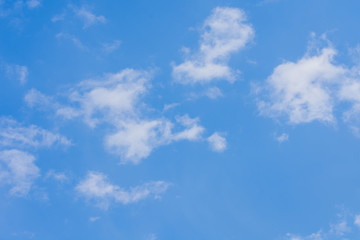 White clouds in the blue sky. Natural background.