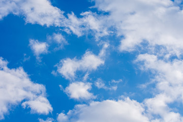 White clouds in the blue sky. Natural background.