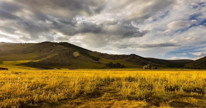Sunset at the Mongolian steppe, The sun goes down at Mongolia , Sunset Landscape timelapse in the Mongolian steppe at Arhangai-Aimag. Motion controll time lapse of the beautiful landscape of Mongolia