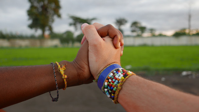 Black And White Hands Entwined