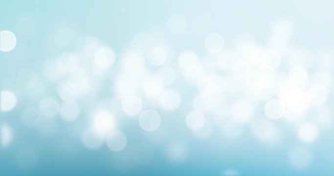 Bokeh background, blue sky with circle glitter light blur. Soft glowing snow vivid bright abstract effect