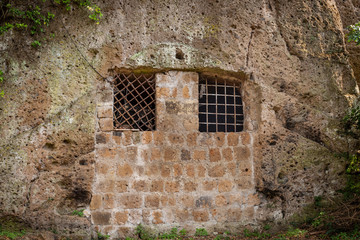 detail of a window of an ancient cave house excavated in the rock