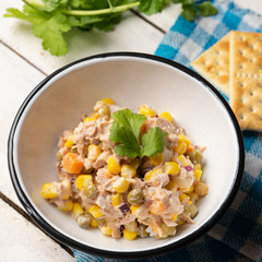 Tuna salad with mayonnaise on white background
