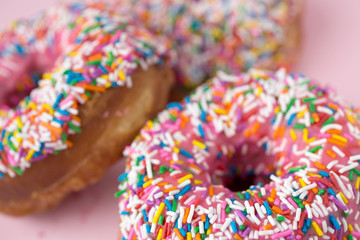 Pink donuts on pink background