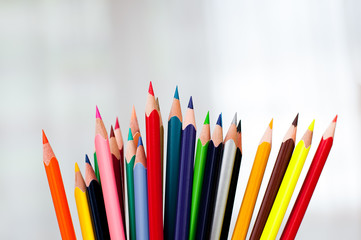 color pencils on a light background, selective focus, creativity concept