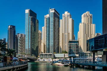 blue, sky, Sunny, day, space, distance, panorama, city, street, palm trees, houses, high-rises, skyscrapers, buildings, concrete, glass, reflections, road, canal, water, reflections, pier, style, arch