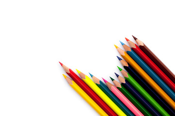 color pencils on a white background in a row, creativity concept