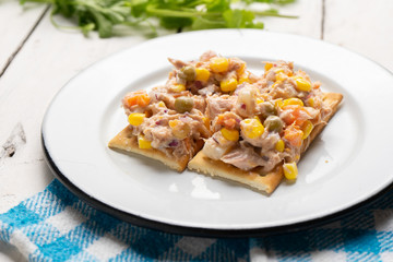 Tuna salad with mayonnaise on white background