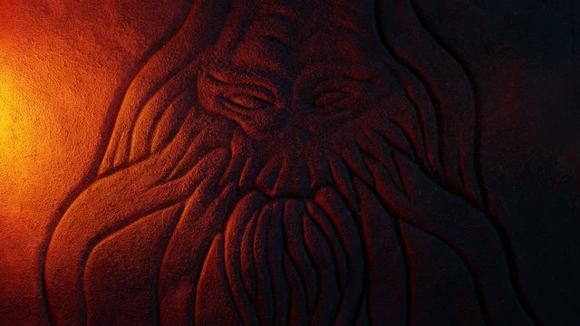 Evil Creature Or Spirit Rock Carving Lit Up