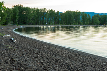 The curving shoreline of Stuart Lake in Paarens Beach Provincial Park, British Columbia, Canada