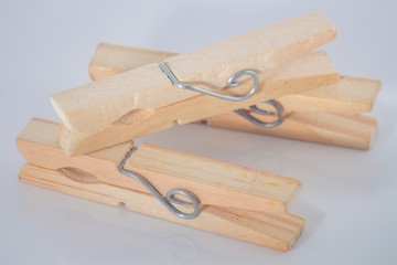 A clothespin or clothes peg is used to hang up clothes for drying, normally on a clothes line. Clothespins often come in many colors and different designs. Can be in plastic or wooden