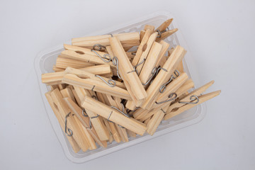 A clothespin or clothes peg is used to hang up clothes for drying, normally on a clothes line. Clothespins often come in many colors and different designs. Can be in plastic or wooden