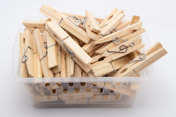 A clothespin or clothes peg is used to hang up clothes for drying, normally on a clothes line. Clothespins often come in many colors and different designs. Can be in plastic or wooden