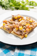 Tuna salad with mayonnaise on white background