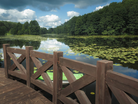 The lake reflects the surrounding landscape like a mirror