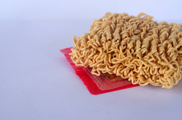 Instant dry noodles, isolated on a white background Food is popular with modern children 