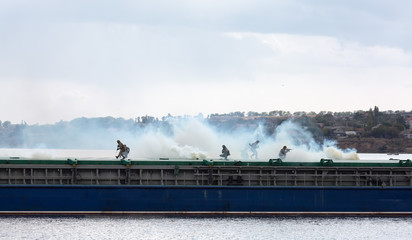 Soldiers on a battle mission to capture a barge