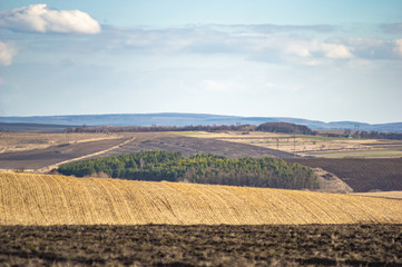 Fototapeta premium Plowed field in autumn day