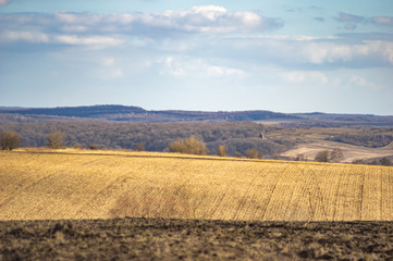 Plowed field in autumn day