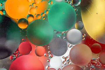 abstract background colored circles of oil on water