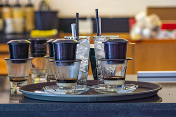 Vietnam retro styled condensed milk coffee on table