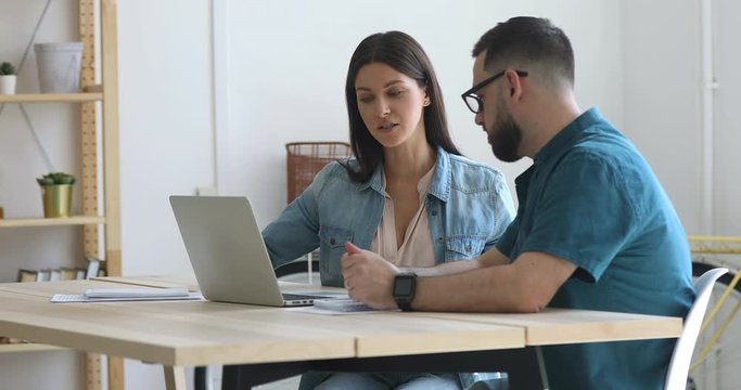 Two employees discussing corporate software, research results, developing strategy.