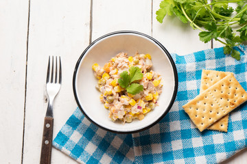 Tuna salad with mayonnaise on white background