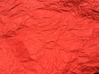 Red crumpled paper texture background for Design. Wallpaper  for copy space